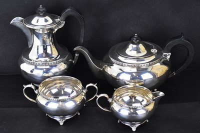 Lot 790 - A George V hallmarked silver four-piece tea...