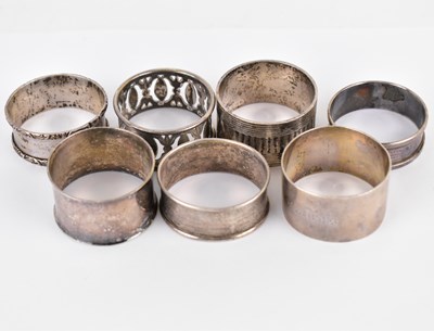 Lot 806 - Six hallmarked silver napkin rings, all of...