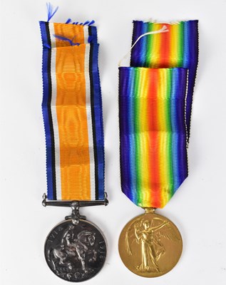 Lot 540 - A pair of WWI War and Defence Medals, awarded...