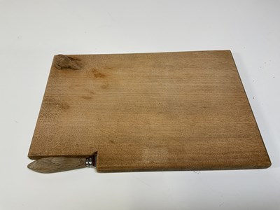 Lot 35 - A Mouseman cheeseboard with cheese knife.