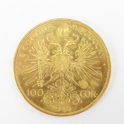 Lot 830 - A 1915 Austrian 100 Corona 0.900 fine gold...