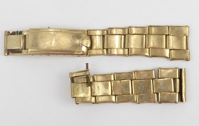 Lot 1168 - ROLEX; two sections of a 9ct gold watch strap,...