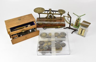 Lot 193 - A small quantity of vintage weights and scales.