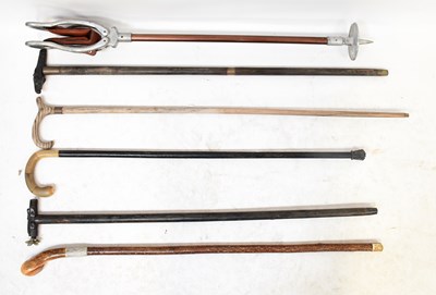 Lot 178 - A small collection of walking sticks,...