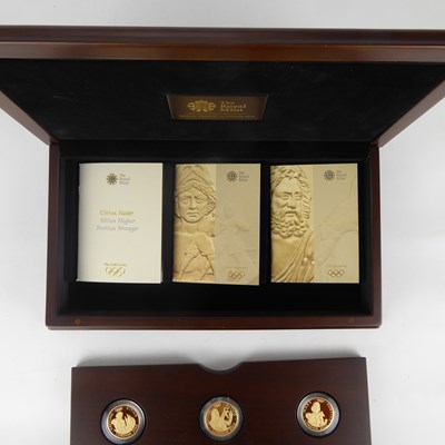 Lot 811 - ROYAL MINT; 'The Gold Series', three sets,...