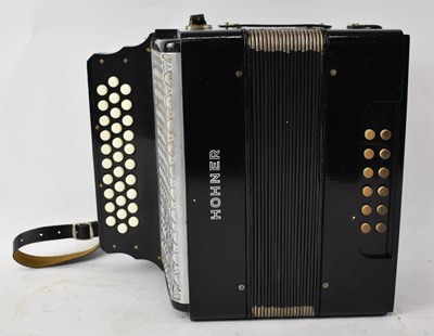 Lot 346 - A Hohner 3-row button accordion.