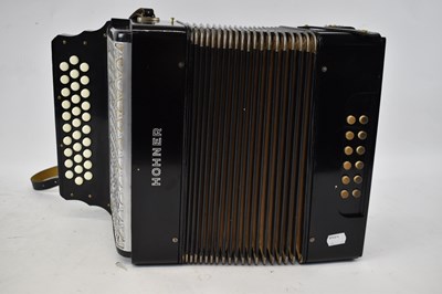 Lot 346 - A Hohner 3-row button accordion.