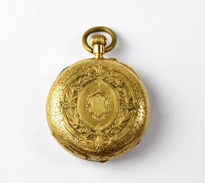 Lot 1099 - A 14K gold small open face pocket watch