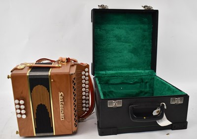 Lot 337 - A modern Castagnari accordion in cherry finish,...