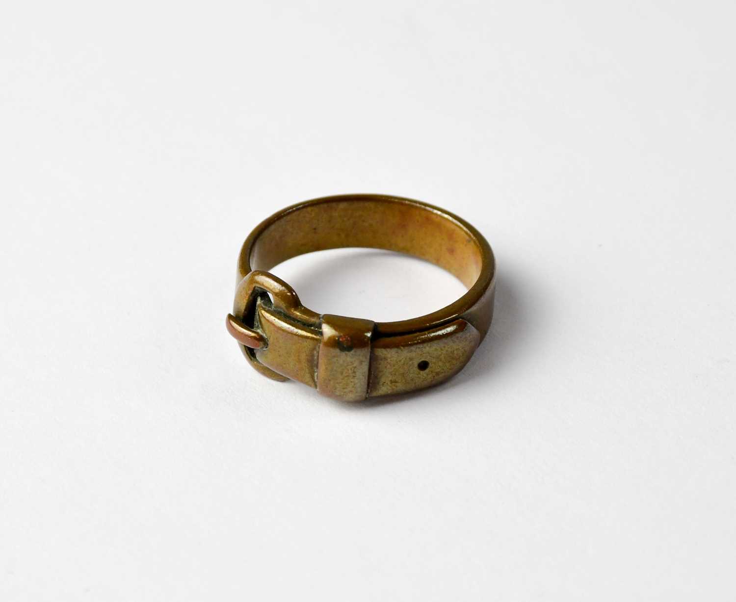 Lot 454 - An unusual WWII trench art buckle ring