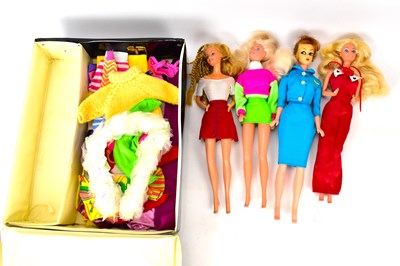 Lot 380 - BARBIE; a Barbie case containing three Barbie...