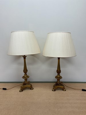 Lot 332 - A pair of late 19th century brass table lamps...