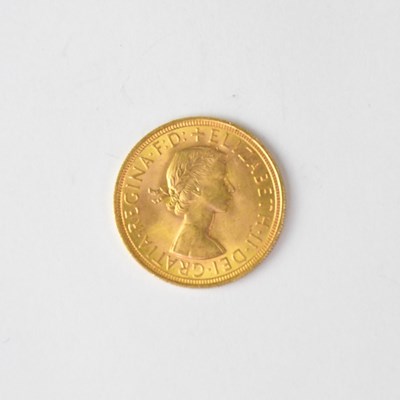 Lot 879 - An Elizabeth II sovereign 1957, George and...