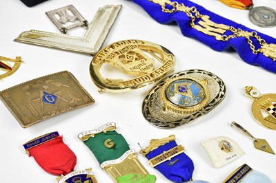 Lot 1068 - A group of various Masonic medals and belt...