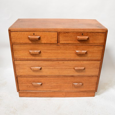 Lot 8 - A modern solid oak chest of two over three...