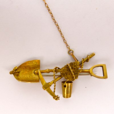 Lot 1049 - A vintage 9ct gold South African gold miner's...