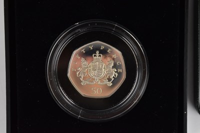 Lot 930 - ROYAL MINT; two silver collectors' coins,...