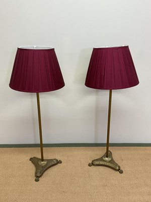 Lot 336 - A pair of brass table lamps with reeded...