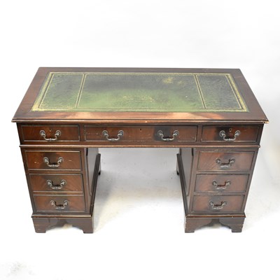 Lot 16 - A modern reproduction pedestal desk, the inset...