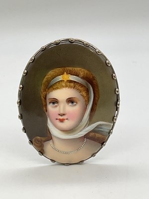 Lot 387 - An oval porcelain hand painted plaque...