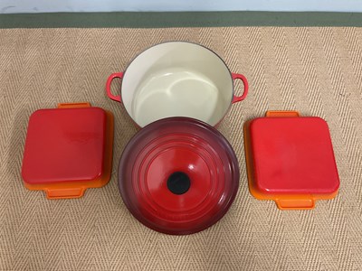 Lot 99 - LE CREUSET; a cast iron large casserole and...