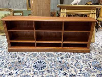Lot 781 - A contemporary oak long open bookcase, with...