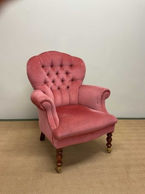 Lot 782 - A contemporary pink upholstered tub armchair...