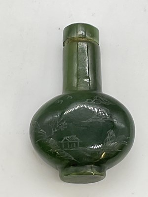 Lot 220 - A Chinese nephrite jade snuff bottle, both...