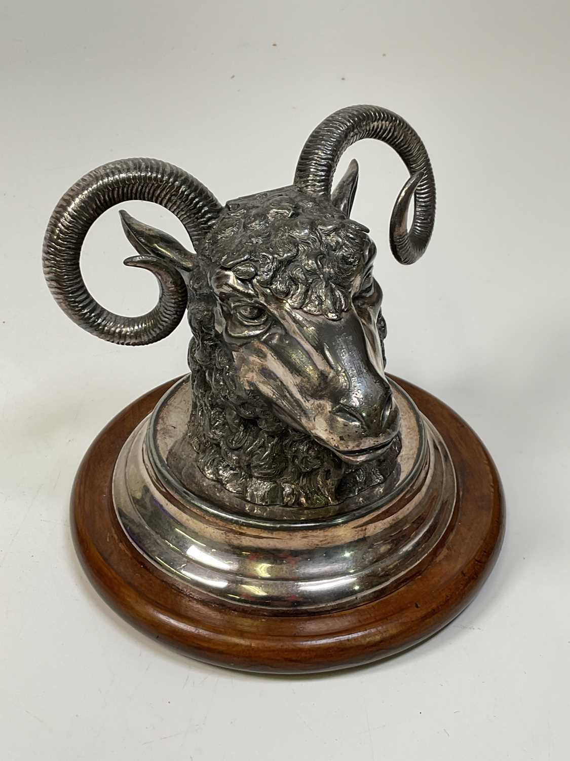 Lot 1000 - A Victorian silver plated ram's head inkwell,...