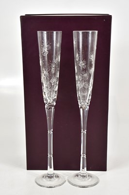 Lot 1575 - ASPREY; a cased pair of glass flutes with...