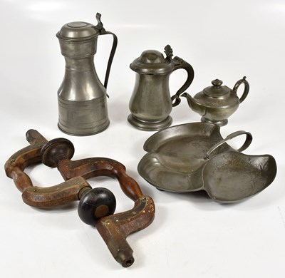 Lot 1129 - A Georgian pewter tankard, height 19.5cm,...