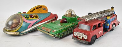 Lot 299 - A Chinese tinplate moon rocket, tinplate fire...