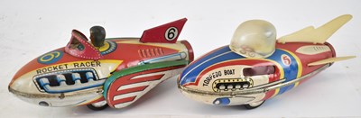 Lot 322 - A Chinese tinplate rocket racer and torpedo...