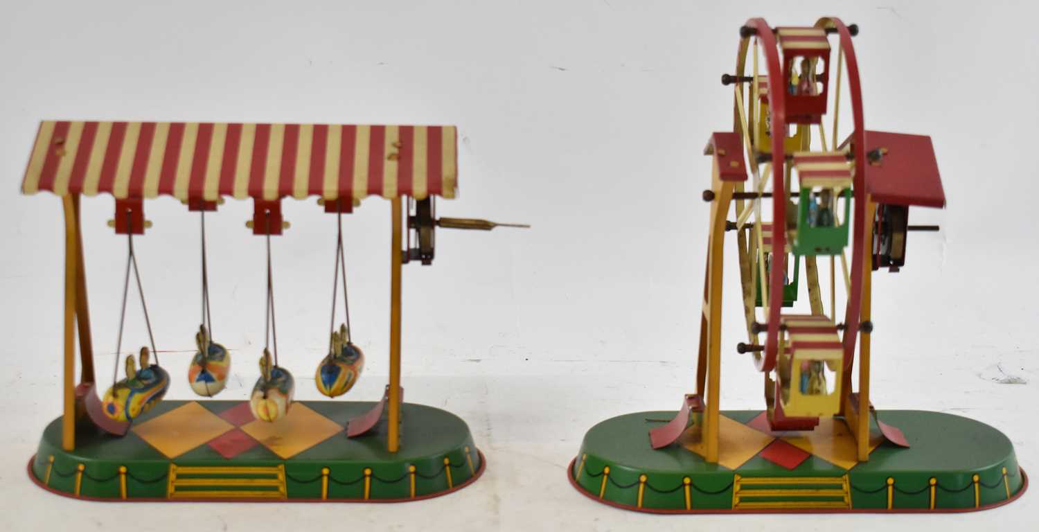 Lot 297 - JOSEF WAGNER; two coloured tinplate fairground...