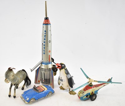 Lot 320 - A group of tinplate toys, to include Sky...