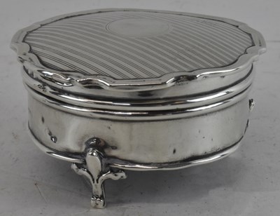 Lot 663 - A George V hallmarked silver trinket box,...