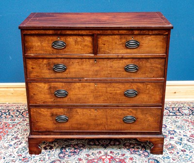 Lot 2393 - An early 19th century mahogany chest of two...