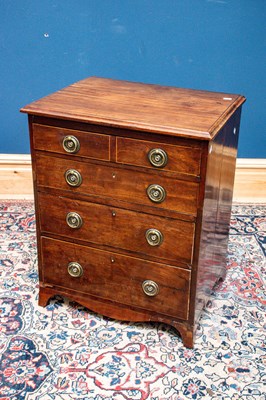 Lot 2444 - A small 19th century mahogany chest of four...