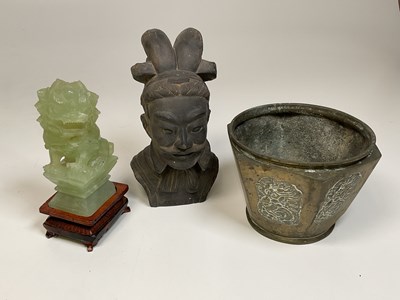 Lot 237 - A carved jade dragon, a bust of a Chinese man...