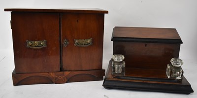 Lot 226 - A late Victorian walnut and ebonised desktop...