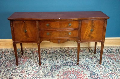 Lot 2611 - A reproduction mahogany serpentine front...