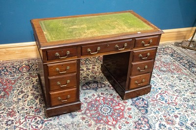 Lot 2590 - A reproduction mahogany nine drawer pedestal...