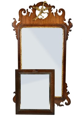 Lot 2529 - A Chippendale style walnut fret carved wall...