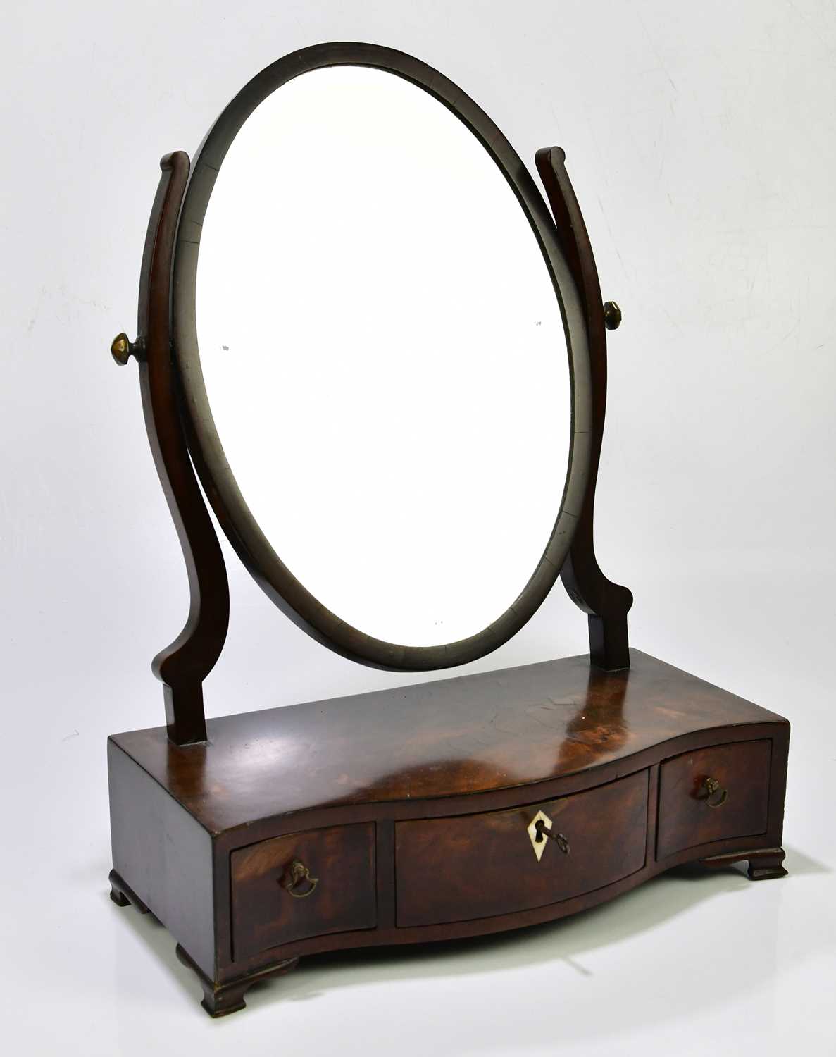 Lot 2530 A 19th century mahogany oval toilet mirror,