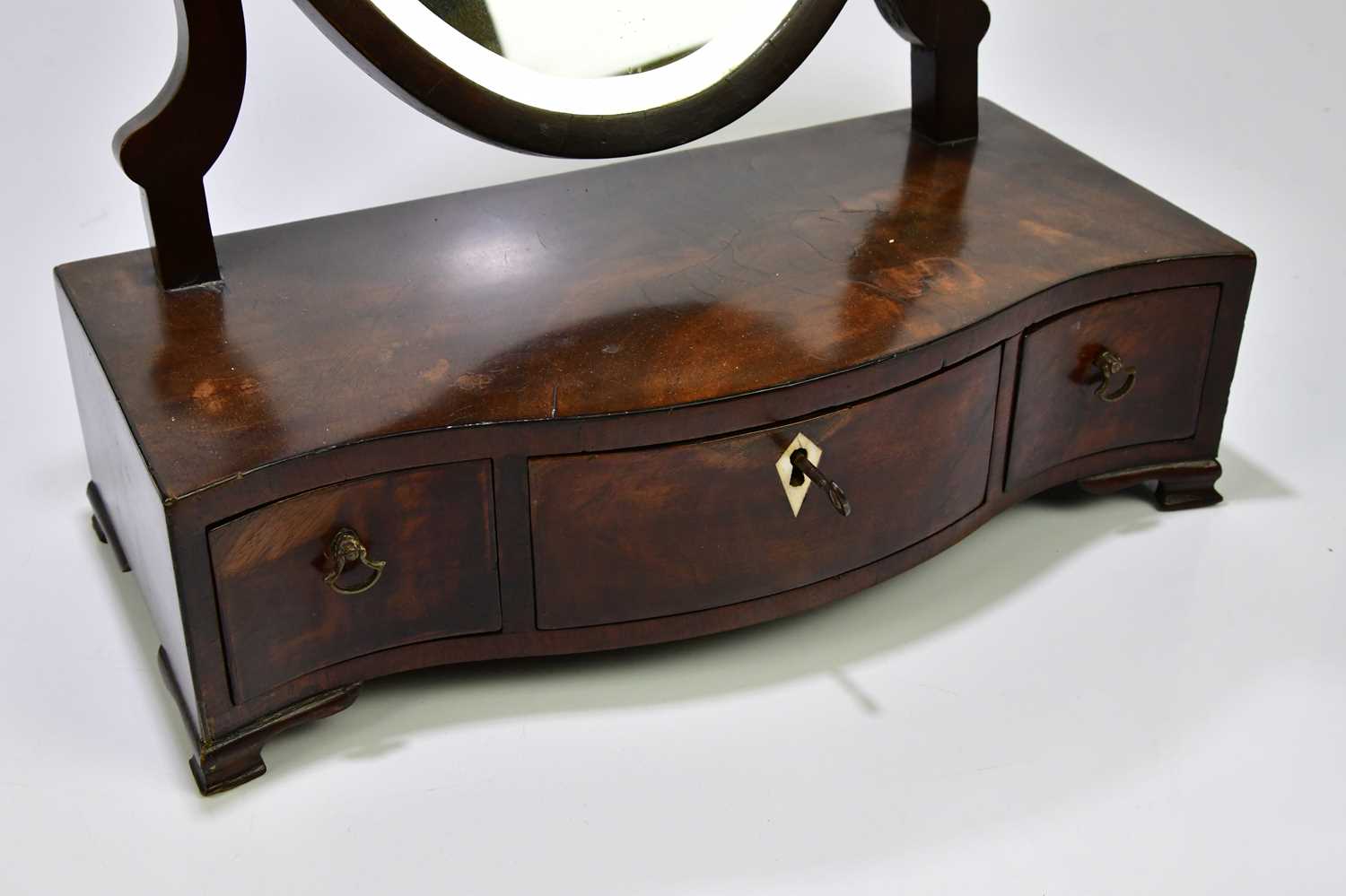 Lot 2530 A 19th century mahogany oval toilet mirror,