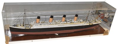 Lot 358 - A large model of RMS Titanic presented under a...