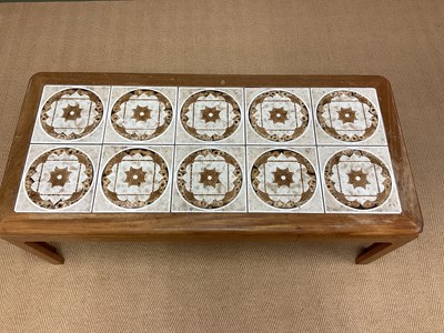Lot 518 - G-PLAN; a tile top table, height 40cm, width...