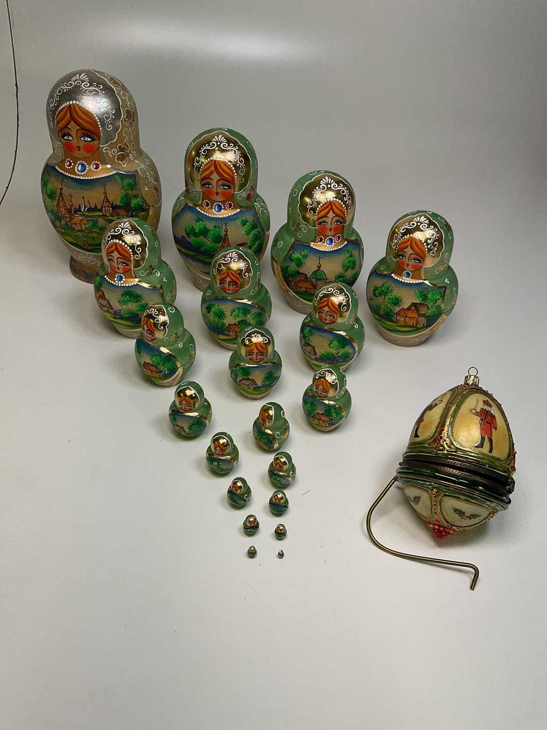 Lot 28 - A set of twenty Russian nesting dolls with...