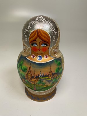 Lot 28 - A set of twenty Russian nesting dolls with...