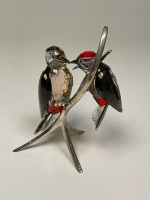 Lot 207 - SWAROVSKI; a crystal model of two woodpeckers...